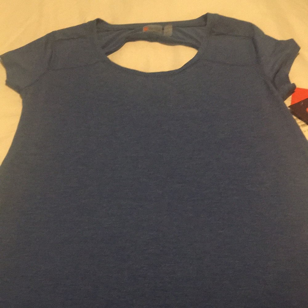 Brand new never worn relaxed fit top